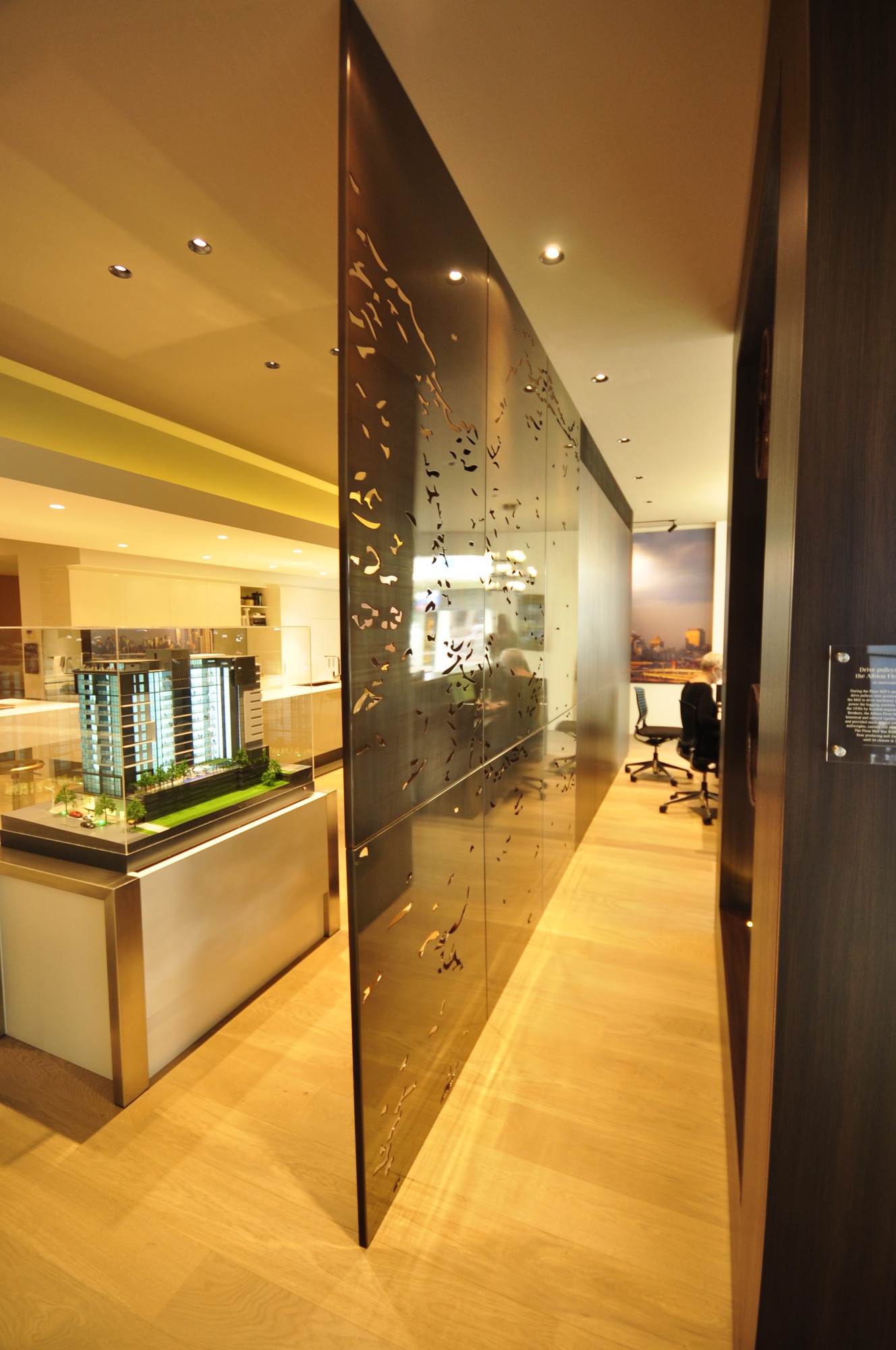1.6mm rigid screens with Medium Brown Bronze Clear Gloss finish @ Charter Hall office, Sydney 