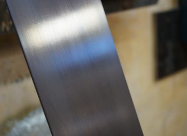 PROCYON NATURAL on brushed stainless base metal