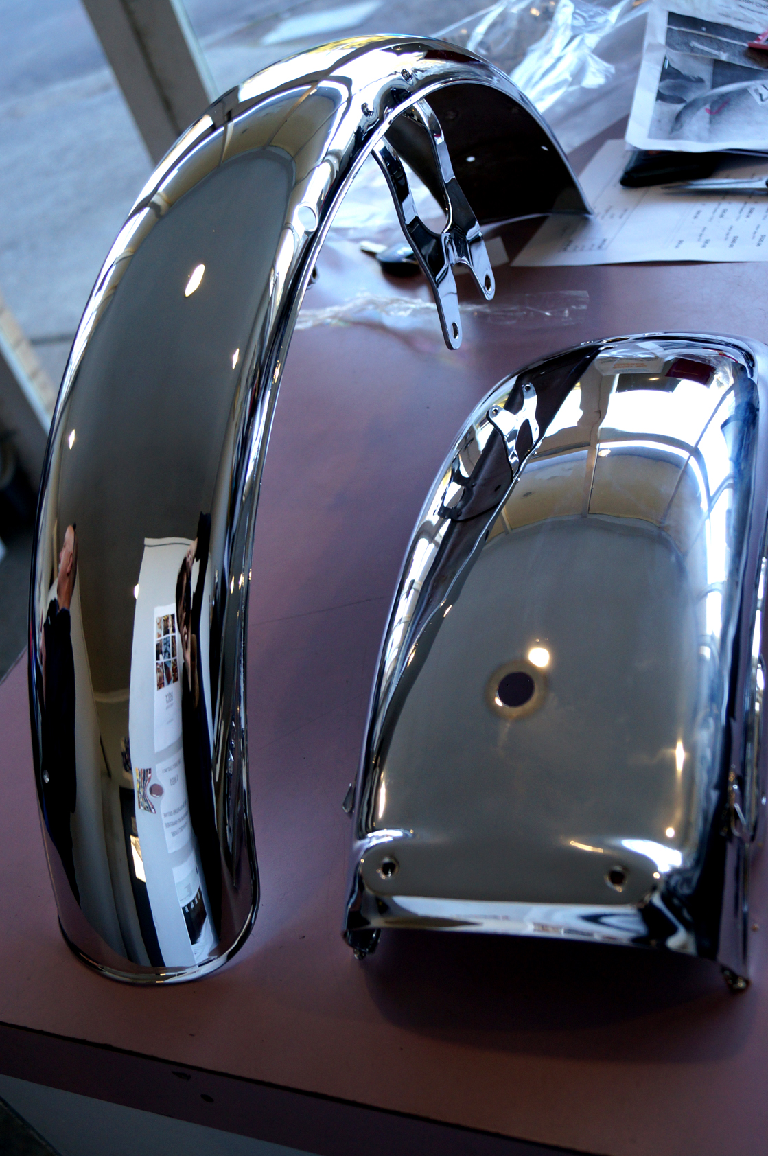 Mirror polished and chrome plated 1950s motorcycle wheel guards - finish vastly improved with heavy copper plating first